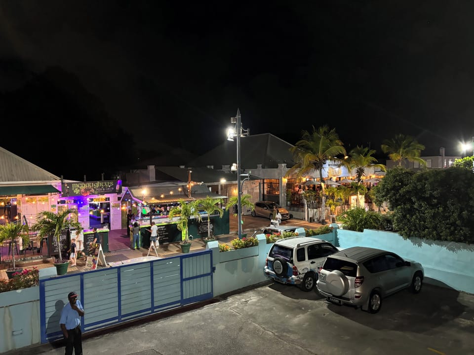 View of vibrant nightlife from condo complex - right outside .