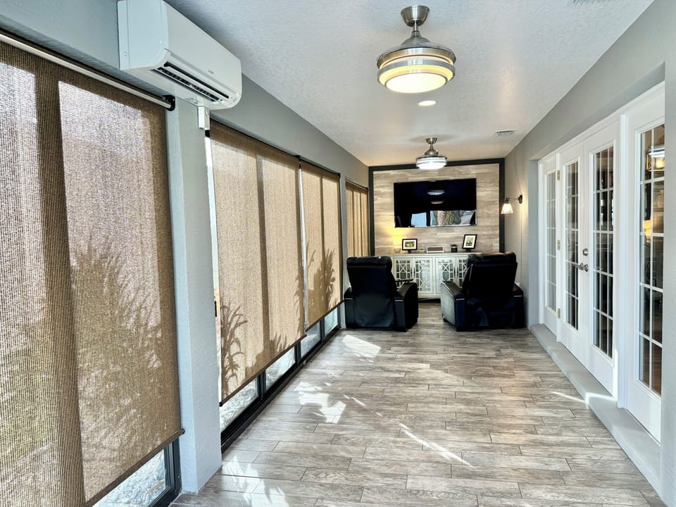 Screened-in Lanai with Darkening Shades and Flatscreen TV