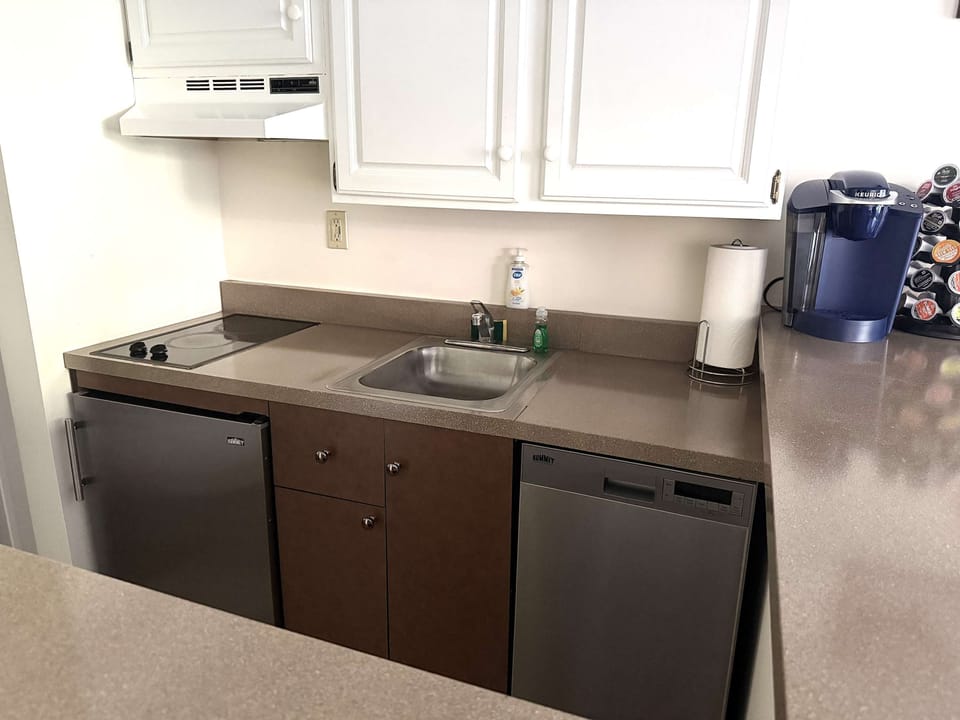 Redone kitchen Countertops and New appliances.. and a stocked Keurig :)