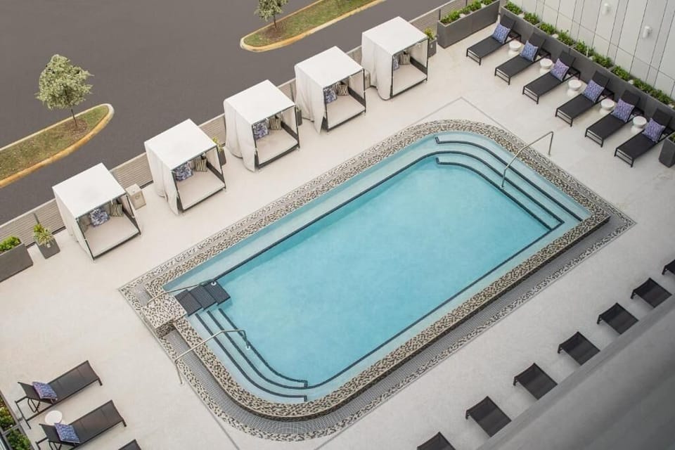 Stretch out in a private cabana beside the sparkling pool.