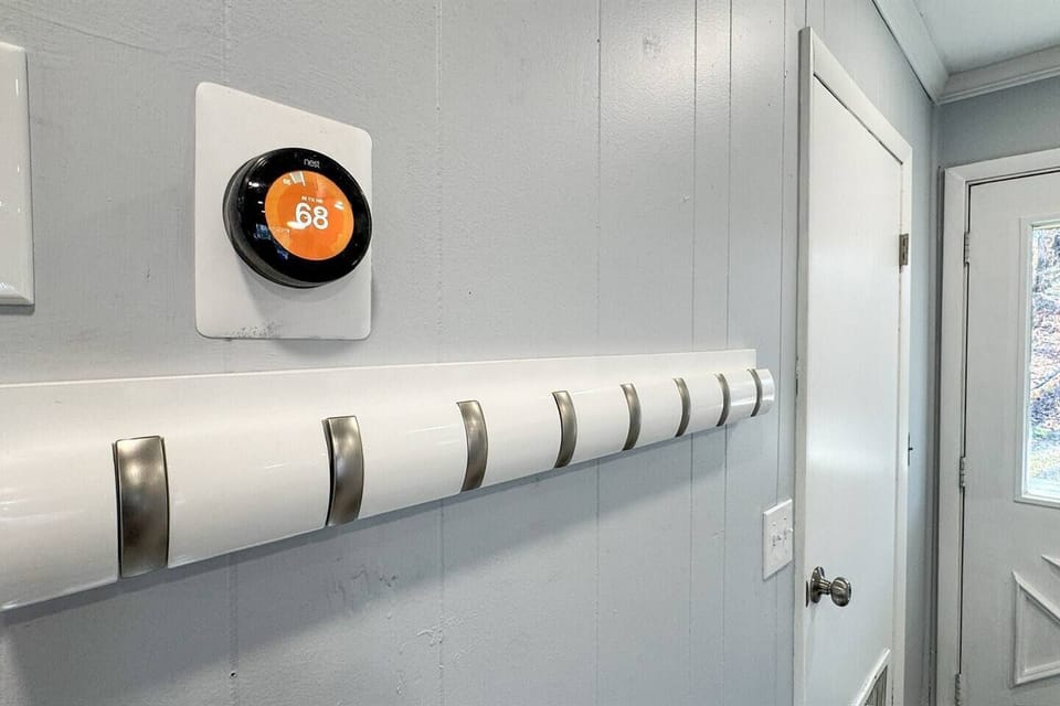 First floor Nest thermostat and coat hangers