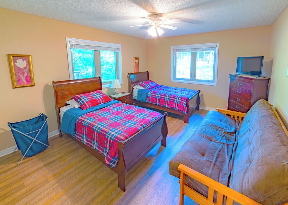 Two twin beds plus futon on main level. 