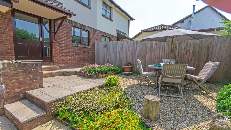 Suntrap garden with patio furniture