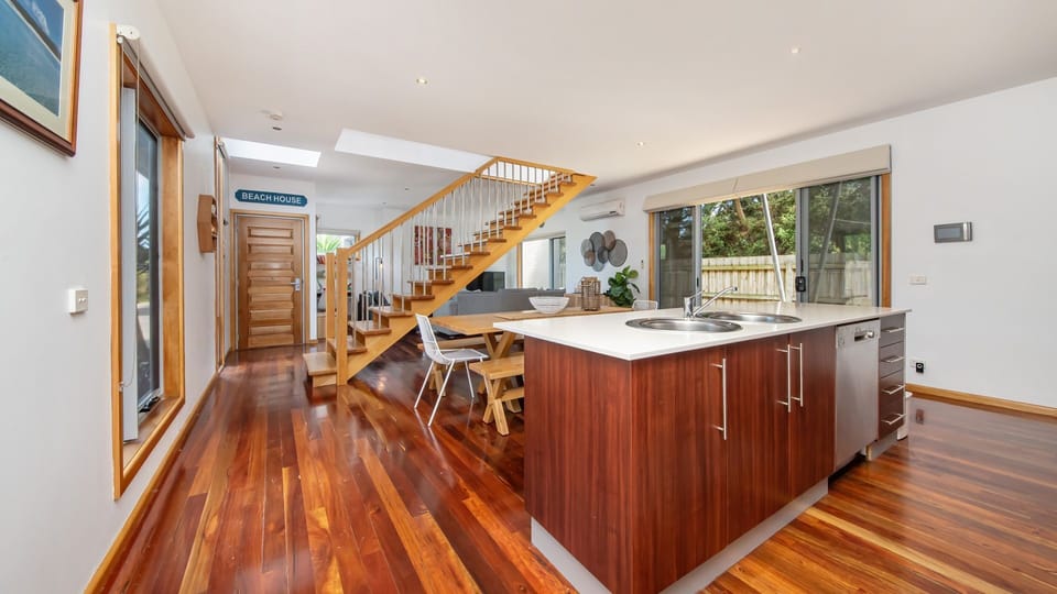 Open plan kitchen and dining on to living
