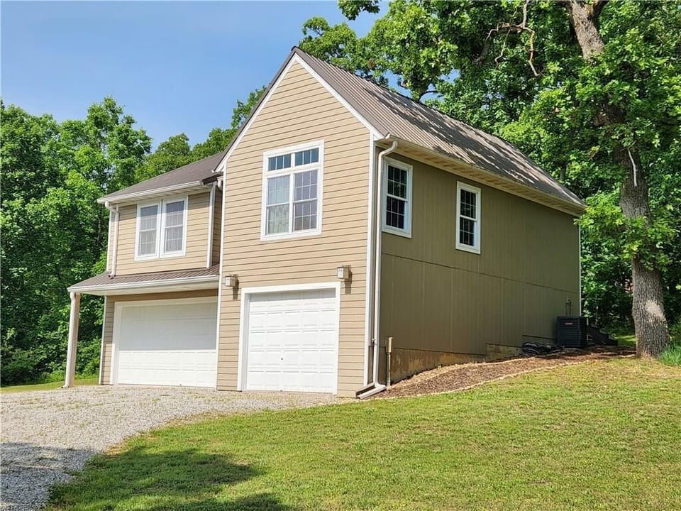 Welcome to Peaceful Pointe! Private drive take you to 9 acre get-a-way.