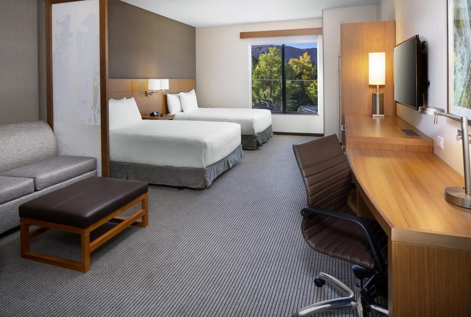 Settle in comfortably with two beds and sunny window views.
