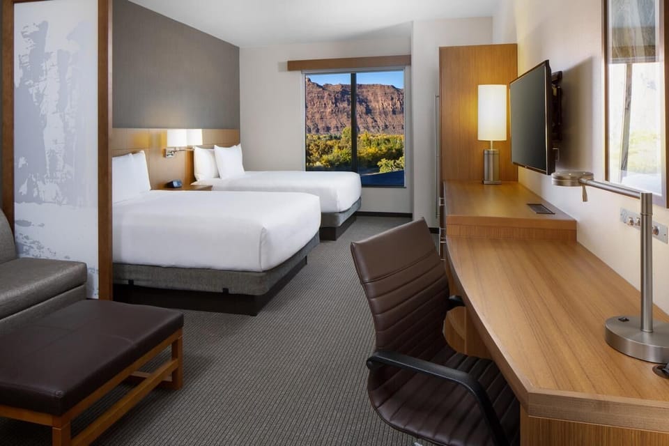 Wake up refreshed to mountain views from plush beds.