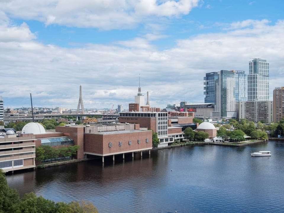 Explore the vibrant waterfront neighborhood just beyond your window.