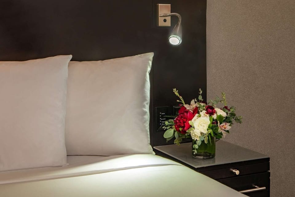 Feel pampered with thoughtful touches and soft bedside lighting.