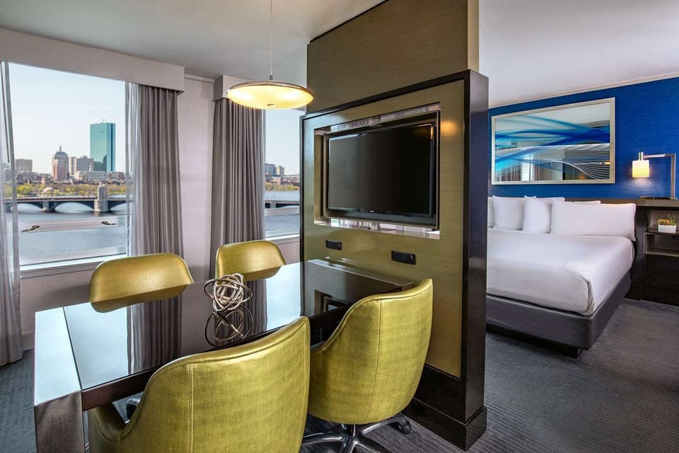 Gather by the window for meals with sweeping river views.