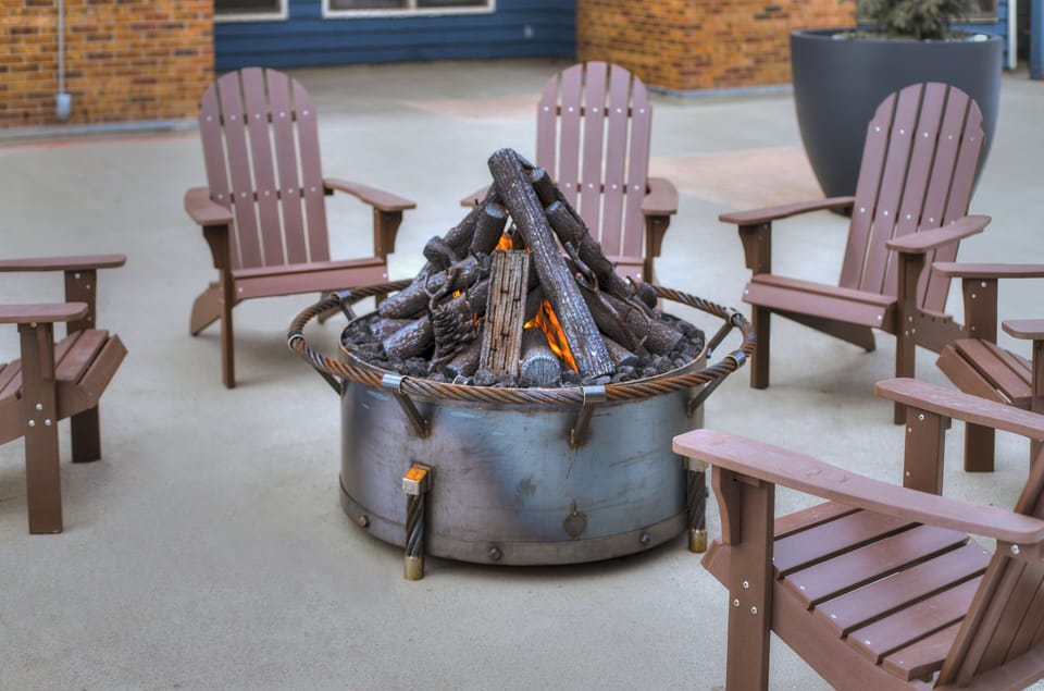 Outdoor firepit with Adirondack chairs