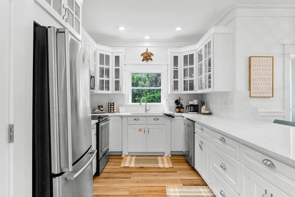 The kitchen is fully stocked with appliances, handy gadgets, and all the utensils you need to prepare and enjoy delicious meals with ease.
