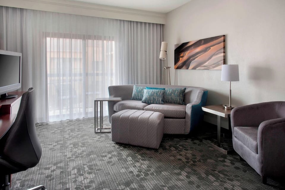 Relax on the roomy sofa and recharge by the window.