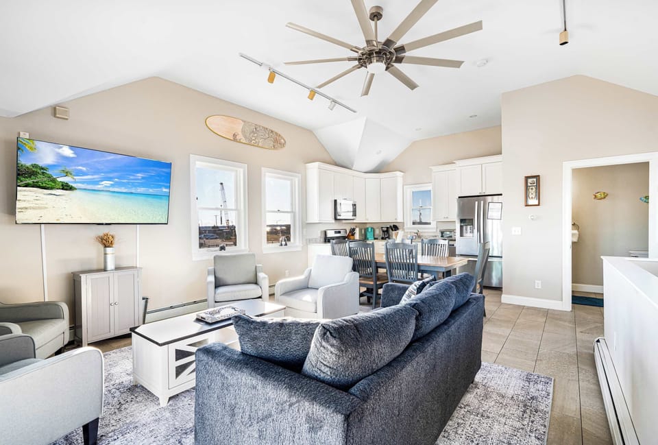 Main living area with large TV and ample seating.  Spectacular views all around!