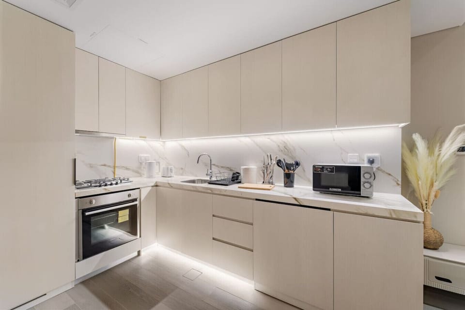Chic Kitchen: Sleek design with modern appliances, perfect for culinary adventures!