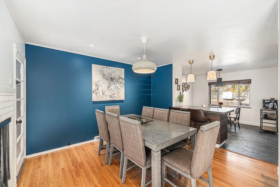 Enjoy meals with family and friends in this spacious dining area, comfortably seating 8 for memorable gatherings.