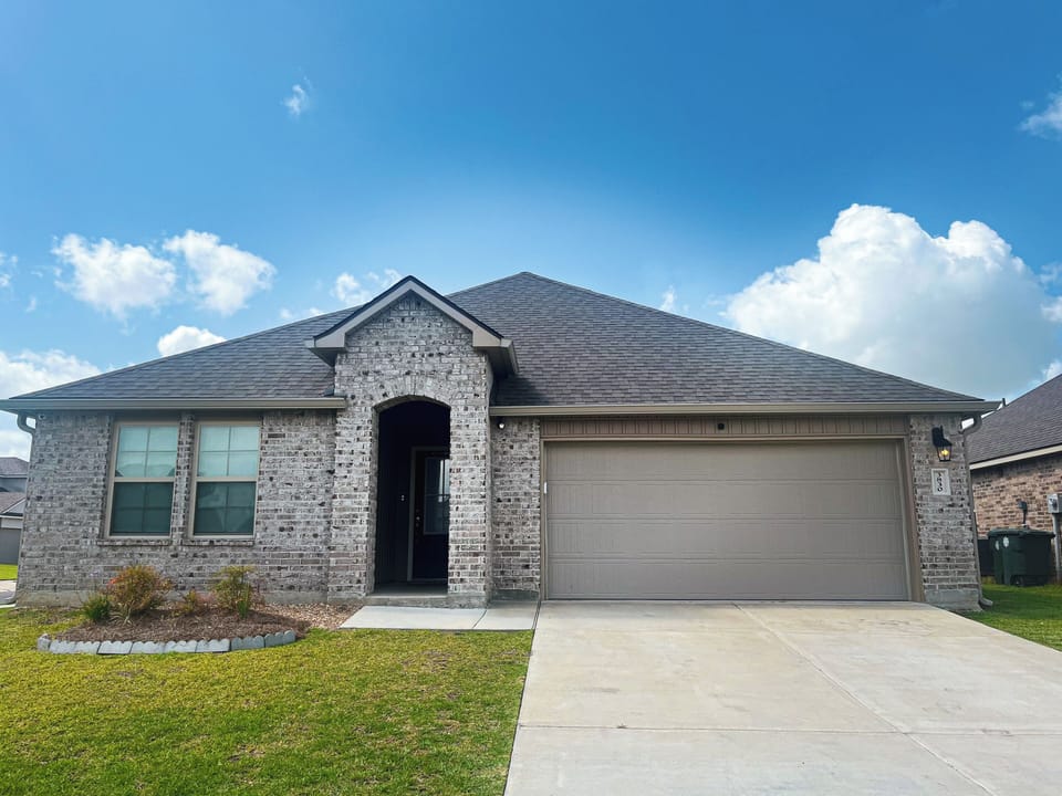 A gorgeous view of your next stay in an expertly maintained property, built after 2020. The house resides in a quiet neighborhood nestled just outside of the city noise. 