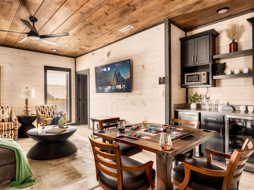A warm and inviting living area with wood-paneled ceilings.