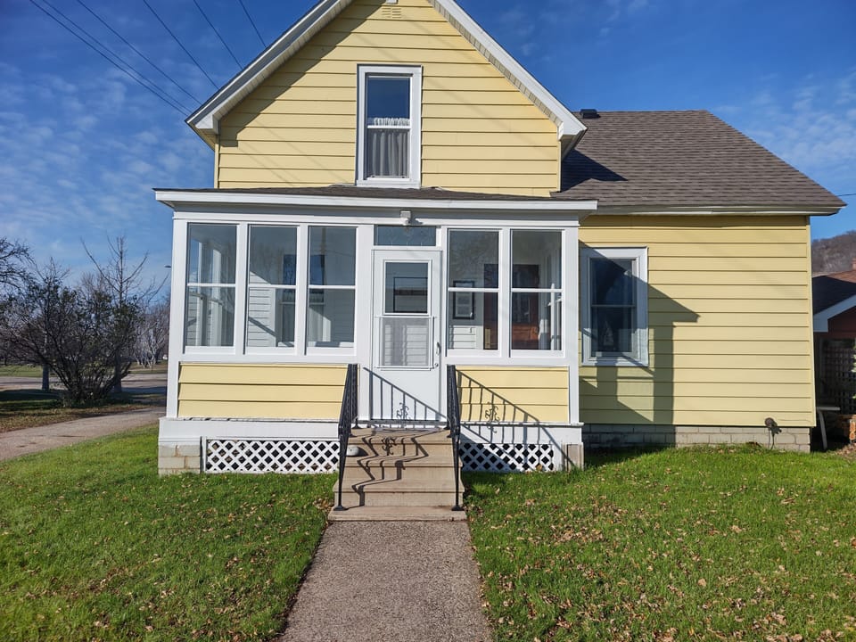 View of the back porch, great sitting area with the sun exposure during the day.