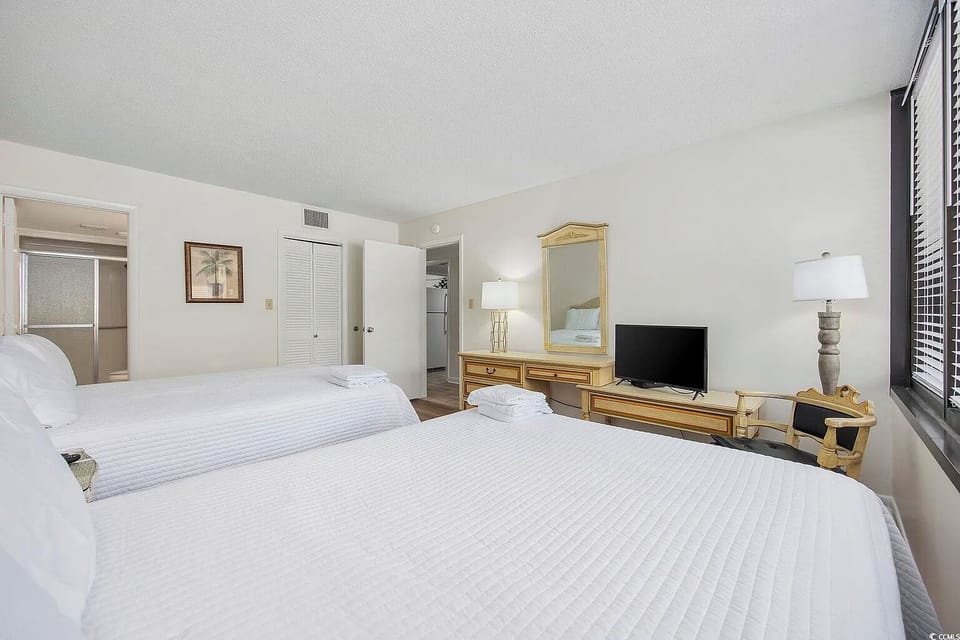 2nd Master Bedroom with 2 Queen Beds and HDTV.