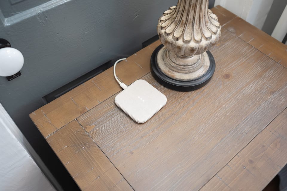 The bedside table in our first king bedroom features a MagSafe charger for your convenience.