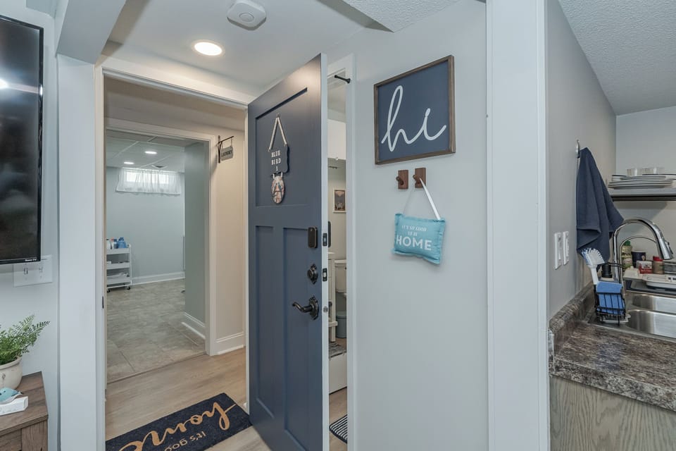 private entrance, dual locks, across hallway from laundry facility