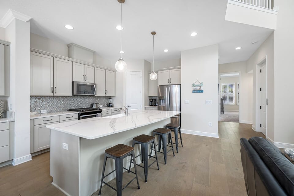 Gourmet kitchen boasts marble countertops