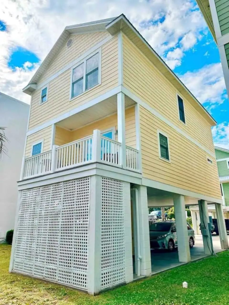 Spacious beach home with elevated porch and private entry