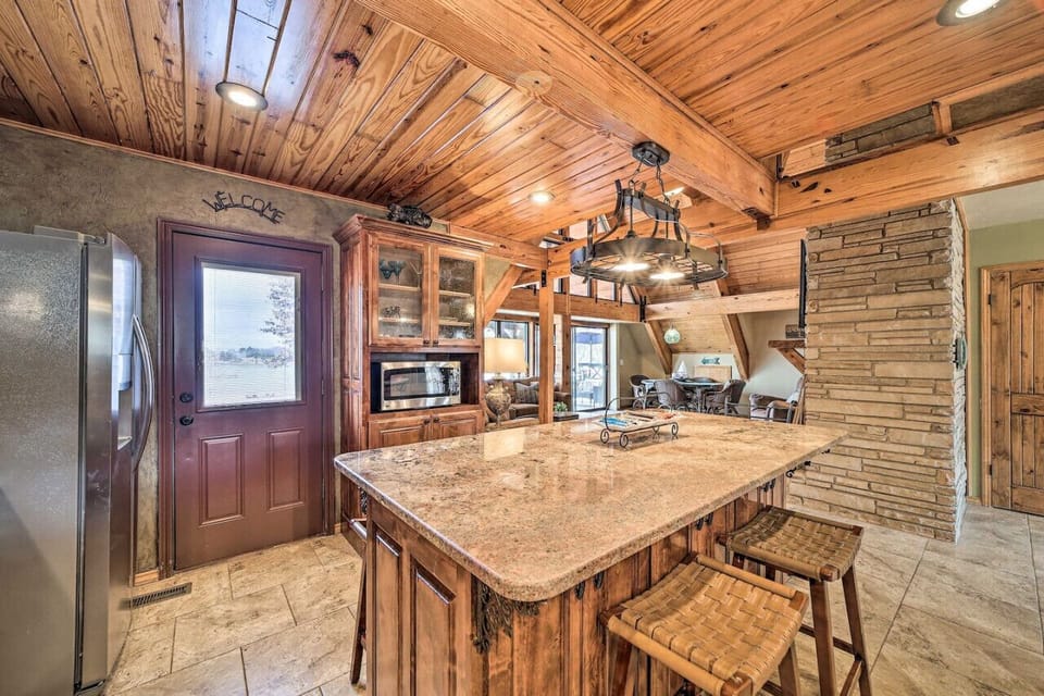 Fully stocked kitchen with island with seating for 4