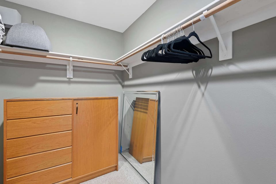 Bedroom 1 with Cal-King bed, Smart TV, balcony access, and ensuite