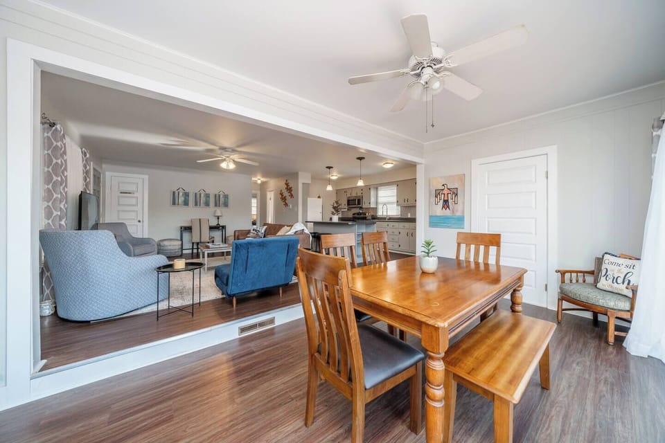 The cottage offers open concept living and dining spaces, giving it an inviting and airy feel.