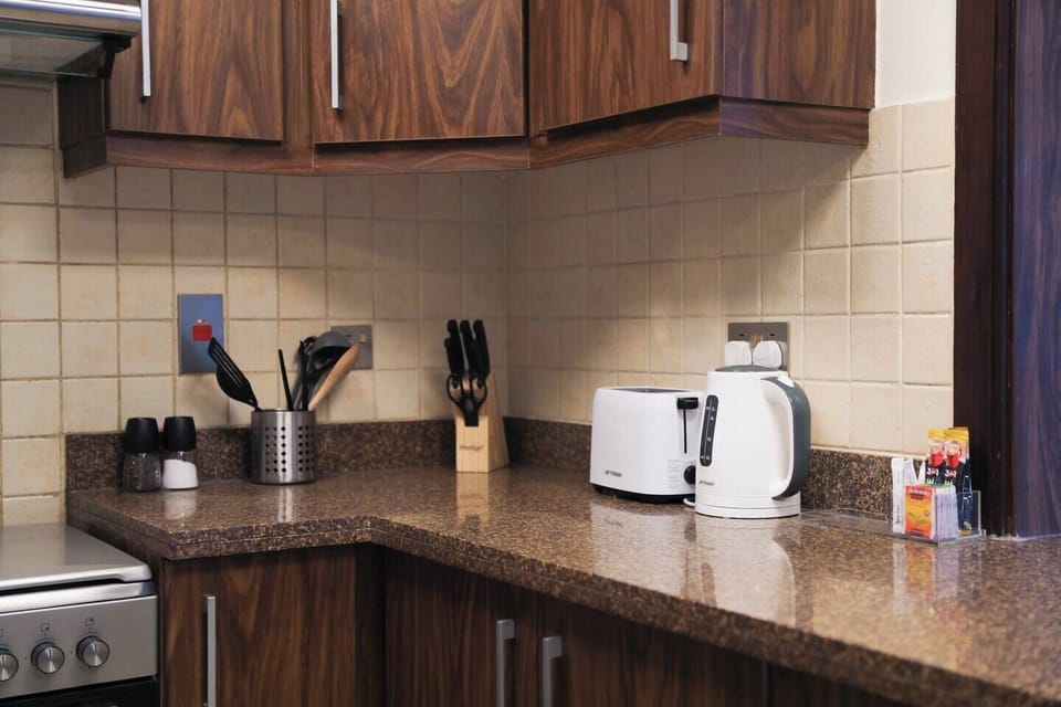Our kitchen comes with all the modern appliances you'd expect at home such as a fridge, coffee & tea machines, dishwasher, microwave, cutleries and more.