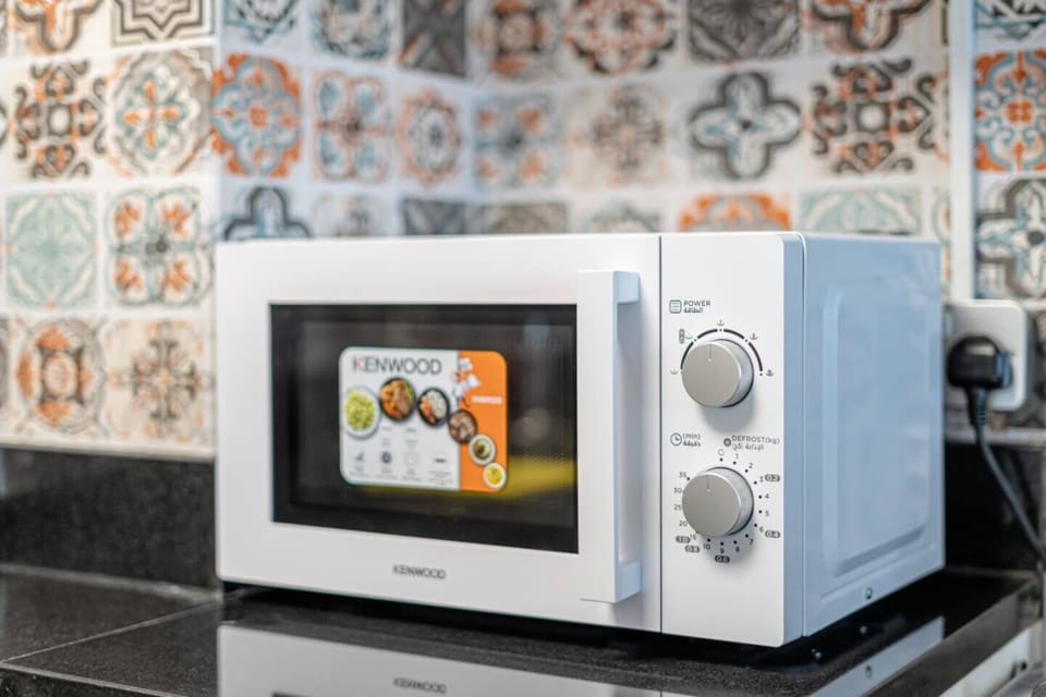 A convenient microwave offering quick and easy meal preparation with user-friendly controls and a sleek design.