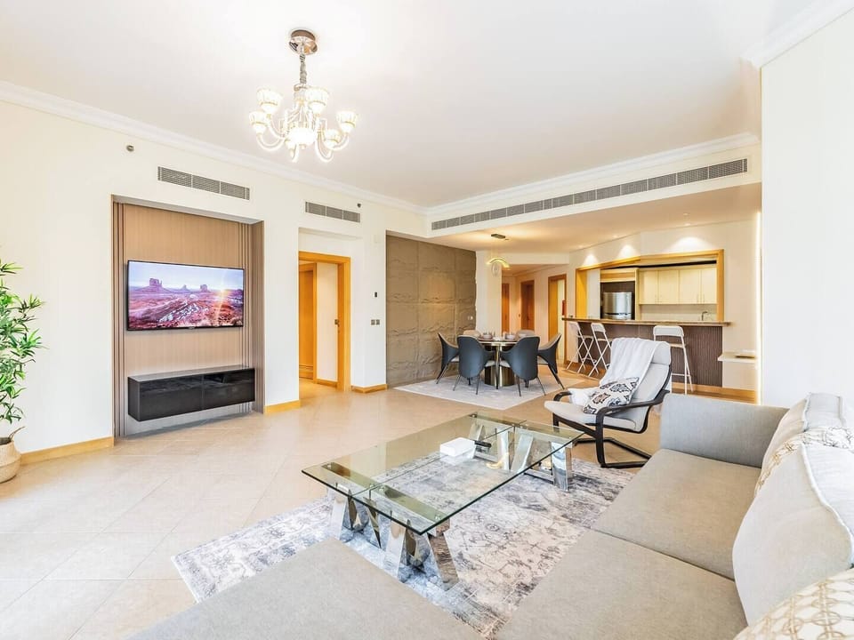 Bright and Spacious Living Area: Relax in our large, sunlit living room with comfortable seating for all guests.