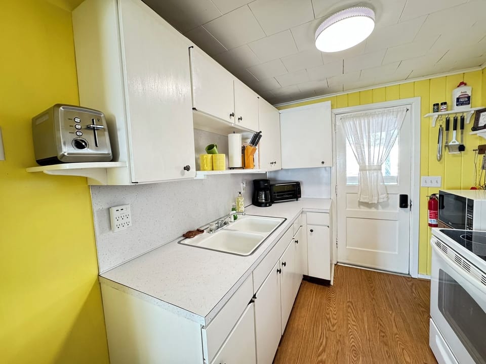 Equipped Kitchen with Typical Utensils, Pots, Pans, Dishes & Glasses
