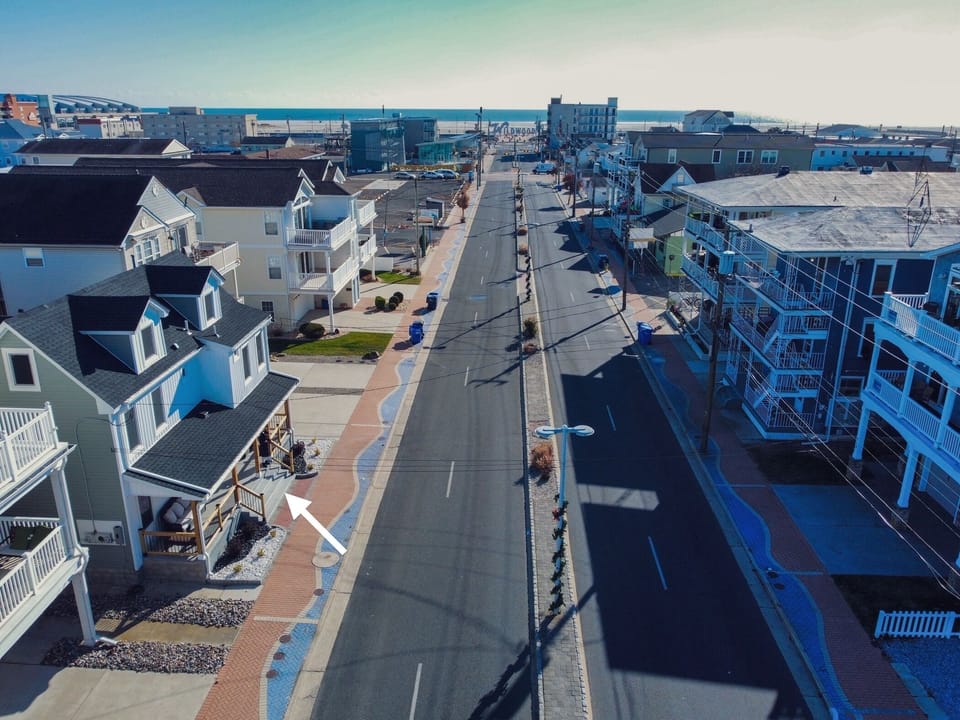 Street view, steps to the beach and main city amenities!