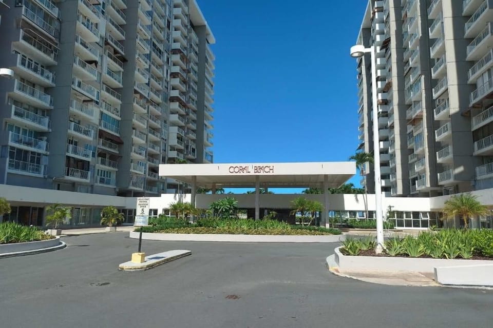 Welcome to Coral Beach Towers — a modern beachfront complex with lush landscaping, secure entry, and stylish architecture just steps from the ocean.