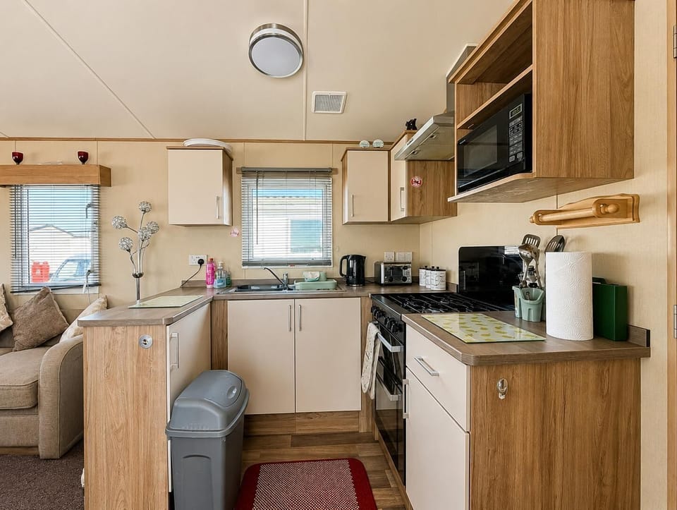 An open-plan dining and kitchen area mean guests can interact and make memories on their 2026 breakaway.