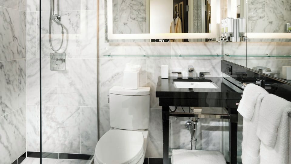 Refresh in a sleek marble bath with spa-like finishes.