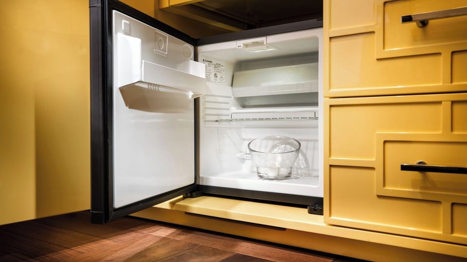Keep drinks perfectly chilled in the convenient mini fridge.