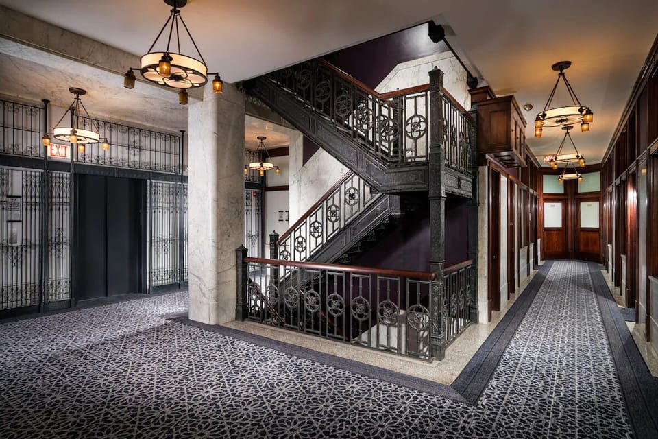 Wander past ornate staircases and vintage details in style.