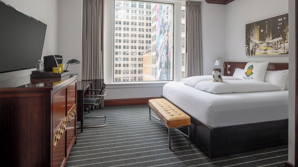 Settle in with a spacious layout, desk, and big windows.