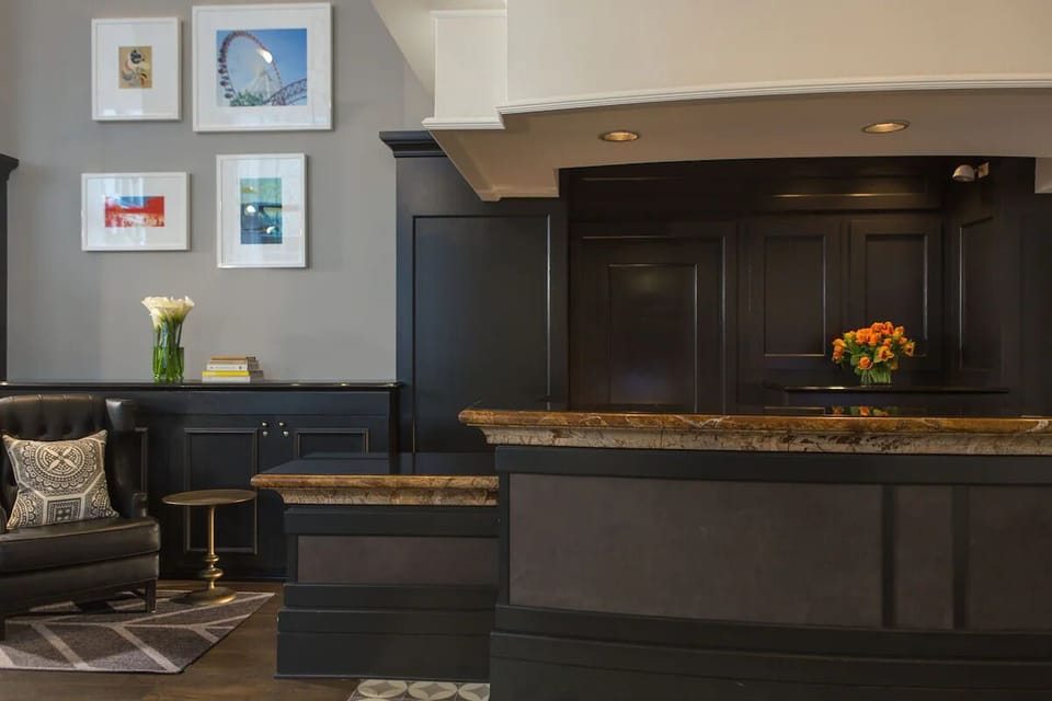 Unwind in a stylish lounge corner with curated local art.