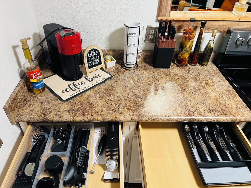 Coffee corner with Nespresso machine.
