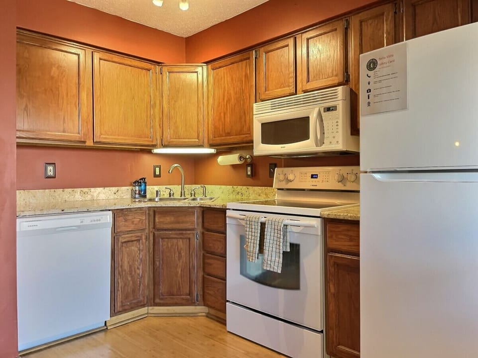 Fully equipped kitchen for basic cooking.