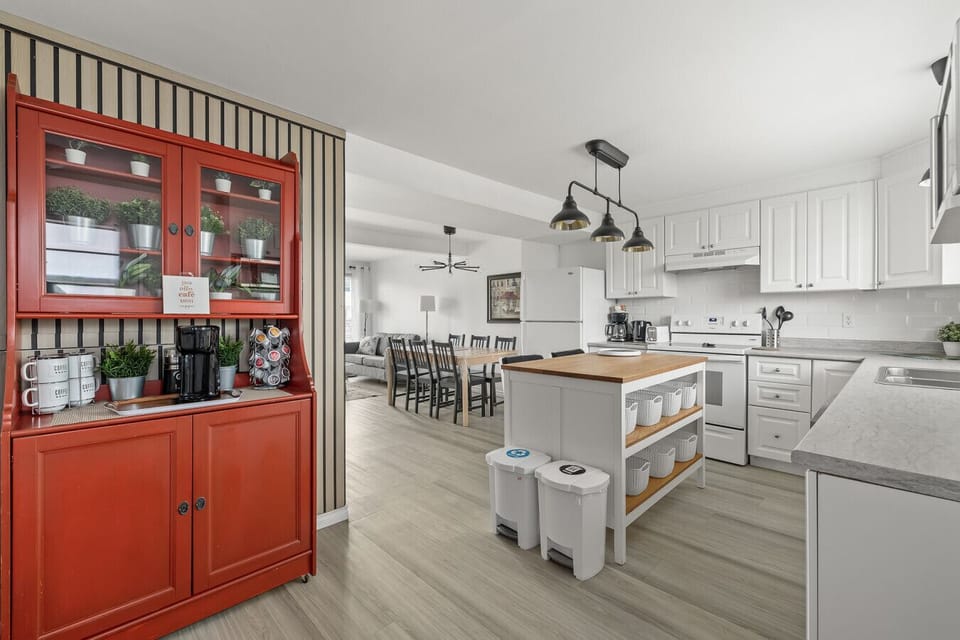 Cozy coffee station with Keurig and spacious dining area, perfect for family meals and gatherings