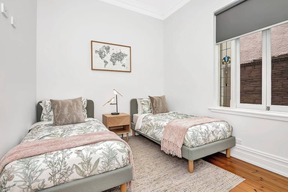 Perfect for families, the third bedroom offers two single beds and black-out blinds with charming decor and a peaceful ambience.

