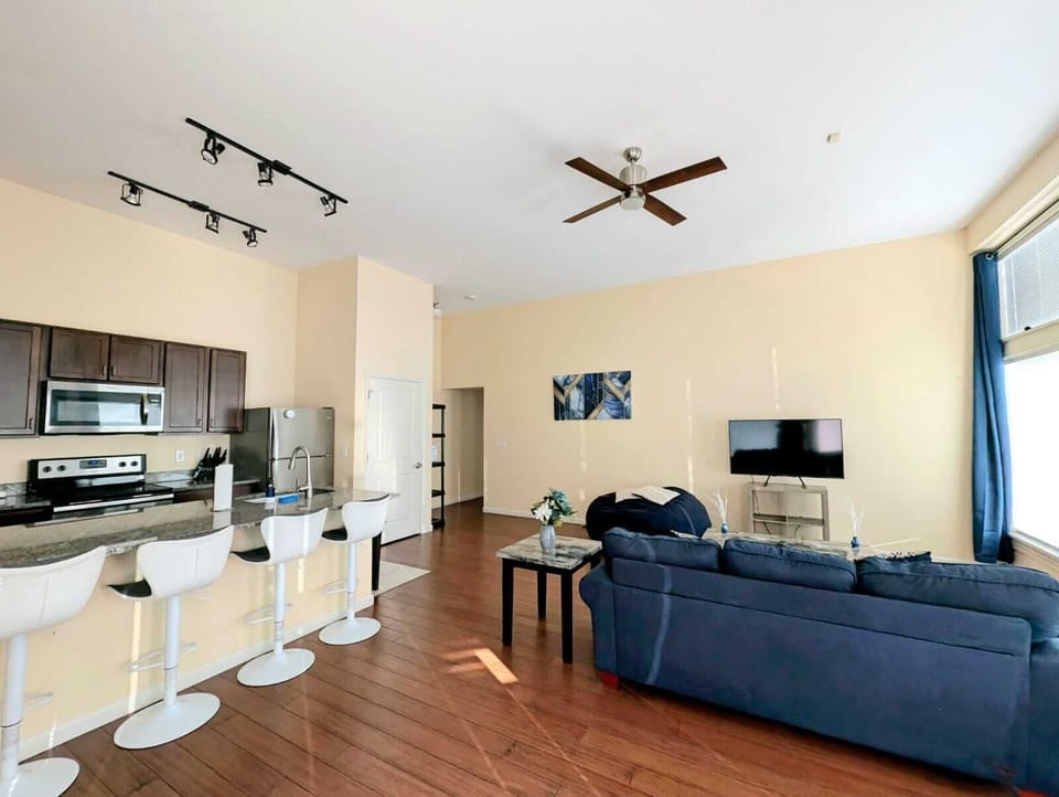 The cozy living room is designed for relaxation and entertainment.
