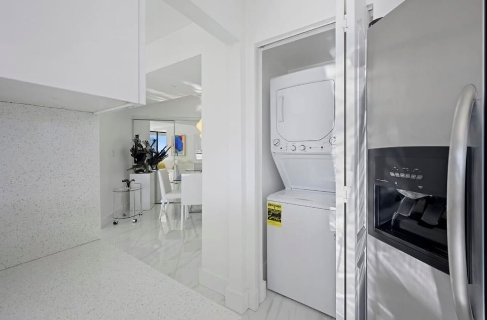 Full washer/drier and modern kitchen