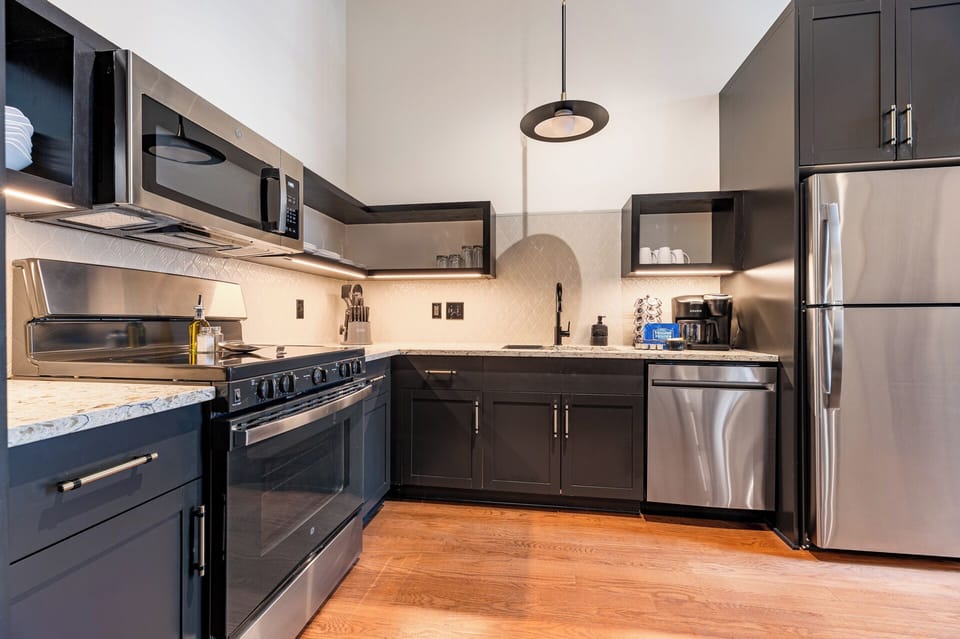 Fully equipped kitchen with modern appliances, offering everything you need for preparing meals or enjoying a morning coffee.